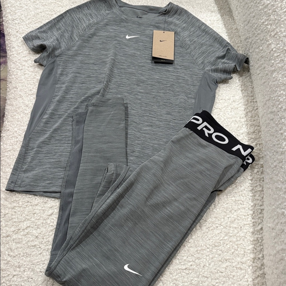 Nike Pro 2 piece Gray Ladies Set. Top L Pants S